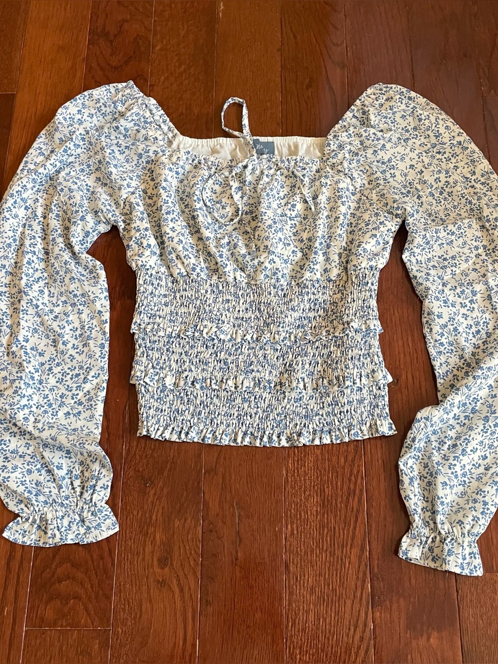 Blue and white floral blouse